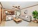 Inviting living room with neutral tones and an open concept to the kitchen at 12087 N Gasburg Rd, Mooresville, IN 46158