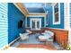 Backyard lounge area features brick patio and comfortable seating at 12605 Branford St, Carmel, IN 46032