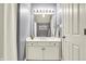 Bathroom with a white vanity, framed mirror, and neutral paint at 12605 Branford St, Carmel, IN 46032