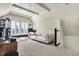 Bonus room with a plush sofa, shutters and light-colored carpet at 12605 Branford St, Carmel, IN 46032