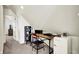 Bonus room with desk, mini-fridge, small desk, and adjacent bath at 12605 Branford St, Carmel, IN 46032
