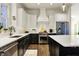 Stylish kitchen with white subway tile, stainless appliances, and a center island at 12605 Branford St, Carmel, IN 46032