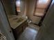 Bathroom featuring a vanity and toilet, offering essential functionality at 1354 Roache St, Indianapolis, IN 46208