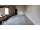 This bedroom has a large window, hardwood floors and neutral colored walls at 1354 Roache St, Indianapolis, IN 46208