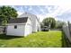 Large, fenced backyard featuring a shed, patio furniture, and a playset at 14153 Jasmine Ct, Fishers, IN 46038