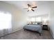 Vaulted ceiling bedroom with neutral walls, carpet floors, ceiling fan, and natural light at 14153 Jasmine Ct, Fishers, IN 46038