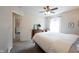Bedroom featuring a bed, soft carpet, and a doorway leading to other areas of the home at 14153 Jasmine Ct, Fishers, IN 46038