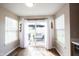 Bright breakfast nook featuring wood floors, a sliding glass door and modern accents at 14153 Jasmine Ct, Fishers, IN 46038