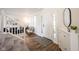 Welcoming foyer with a decorative rug, white front door and a view of the living area at 14153 Jasmine Ct, Fishers, IN 46038