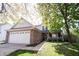 Charming two-story home with a brick facade, attached two-car garage, and well-manicured lawn at 14153 Jasmine Ct, Fishers, IN 46038