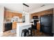 Charming eat-in kitchen with stainless steel appliances, center island, and plenty of cabinet space at 14153 Jasmine Ct, Fishers, IN 46038