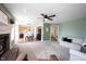 Open-concept living room flowing into a modern kitchen with stainless steel appliances at 14153 Jasmine Ct, Fishers, IN 46038