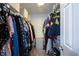 Well-organized walk-in closet with ample shelving and hanging space for clothes and accessories at 14153 Jasmine Ct, Fishers, IN 46038