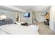Basement bedroom showcasing neutral carpet, a television, and light grey walls at 162 Carmelaire Dr, Carmel, IN 46032