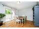 Bright dining room with sliding glass doors leading to the patio at 162 Carmelaire Dr, Carmel, IN 46032