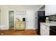 Bright kitchen featuring granite countertops and stainless steel appliances at 162 Carmelaire Dr, Carmel, IN 46032