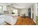 Open kitchen area flowing into the dining room, perfect for entertaining at 162 Carmelaire Dr, Carmel, IN 46032
