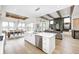 Contemporary kitchen with a spacious island, stainless steel appliances, and open-concept living at 16457 Gleneagles Ct, Noblesville, IN 46060