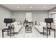 Inviting living room features neutral walls, plush seating, and stylish decor accents at 16457 Gleneagles Ct, Noblesville, IN 46060