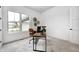 Bright home office provides a comfortable workspace with a large window and modern finishes throughout at 16457 Gleneagles Ct, Noblesville, IN 46060