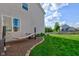 Serene backyard featuring a hammock for relaxation and a lush green lawn at 1662 Cascade Dr, Greenwood, IN 46143