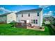 Nice backyard showing a wooden deck, pergola, and well-maintained lawn, perfect for outdoor relaxation at 1662 Cascade Dr, Greenwood, IN 46143