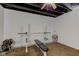 Finished basement space perfect as a home gym and features a ceiling fan at 1662 Cascade Dr, Greenwood, IN 46143