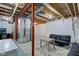 Spacious unfinished basement featuring exposed ceiling and concrete floor offers customization potential at 1662 Cascade Dr, Greenwood, IN 46143