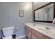 This bathroom offers a double sink vanity and a large mirror for added convenience at 1662 Cascade Dr, Greenwood, IN 46143