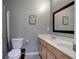 This bathroom offers a double sink vanity and a large mirror for added convenience at 1662 Cascade Dr, Greenwood, IN 46143