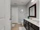 Bathroom with double sink vanity, tile floor and enclosed shower at 1662 Cascade Dr, Greenwood, IN 46143