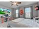 This bedroom boasts natural light, a fan, and closet for ample storage and comfort at 1662 Cascade Dr, Greenwood, IN 46143