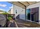 Spacious deck area with access to the home via a sliding door and a staircase to the backyard at 1662 Cascade Dr, Greenwood, IN 46143