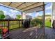 Outdoor deck space with a grill and a partially shaded cover, perfect for outdoor dining at 1662 Cascade Dr, Greenwood, IN 46143