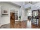 Inviting foyer with hardwood floors leading to adjacent office, living room, and staircase at 1662 Cascade Dr, Greenwood, IN 46143
