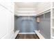 Walk-in closet featuring custom shelving and hanging racks for optimal storage at 16637 Brownstone Ct, Westfield, IN 46074