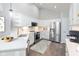 Bright kitchen featuring stainless steel appliances, a breakfast bar and white cabinets at 16637 Brownstone Ct, Westfield, IN 46074