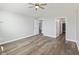 Bright bedroom with vinyl flooring, vaulted ceiling, fan, and ample space at 16637 Brownstone Ct, Westfield, IN 46074
