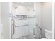 New shower with glass door, white subway tiles and gray accent tiles at 16637 Brownstone Ct, Westfield, IN 46074