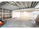 Unfinished basement with open ceiling and concrete floor, ready to be personalized at 1725 Medford Ave, Indianapolis, IN 46222