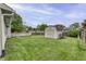 Backyard view showcases shed, deck, and well-maintained lawn at 17752 Sanibel Cir, Westfield, IN 46062
