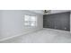Bright bedroom with carpeted floors, a ceiling fan, and modern wall decor at 17752 Sanibel Cir, Westfield, IN 46062