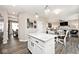 Open concept kitchen featuring stainless steel appliances and sightlines into the living room at 19185 Rioux Grove Ct, Noblesville, IN 46062