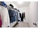 Walk-in closet features ample hanging space and storage shelves for organization at 19437 Astoria Ave, Sheridan, IN 46069