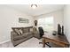 Office featuring a corner desk, a sectional, natural light and an office chair at 19437 Astoria Ave, Sheridan, IN 46069