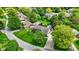 Brick home with in-ground pool and lots of mature trees in an established residential neighborhood at 195 Lake Dr, Greenwood, IN 46142