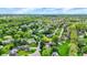 Picturesque neighborhood with a mix of homes, green spaces, and mature trees, creating a welcoming and established environment at 195 Lake Dr, Greenwood, IN 46142