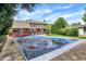 Spacious backyard featuring a large covered pool and manicured landscaping at 195 Lake Dr, Greenwood, IN 46142