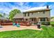 Spacious backyard with a deck, swimming pool, and plenty of seating at 195 Lake Dr, Greenwood, IN 46142