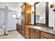Spa-like bathroom with double vanity, modern fixtures and a large framed mirror at 195 Lake Dr, Greenwood, IN 46142